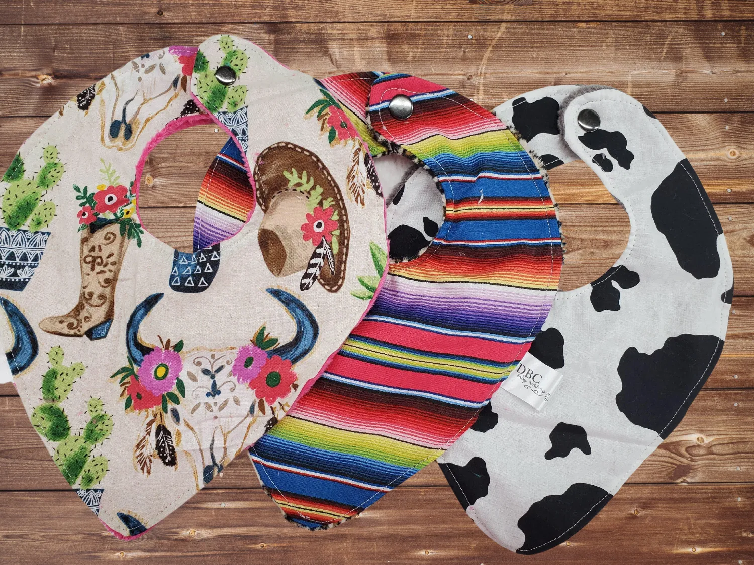 Boots Hat, Serape, and Black Cow Western Bibs